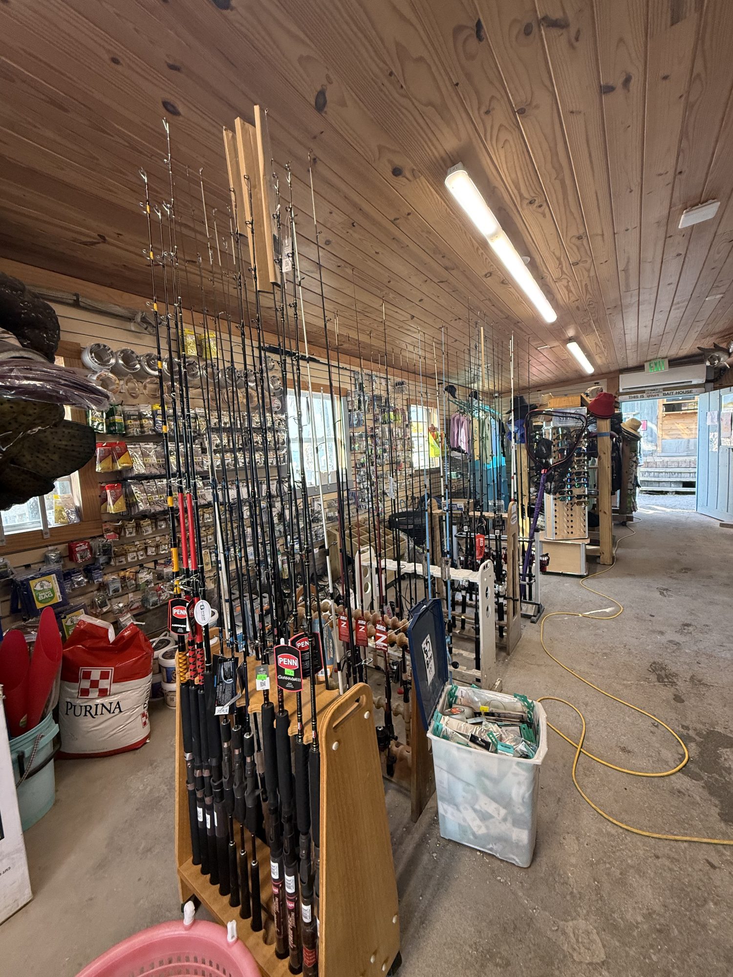 An aisle of tackle and gear inside the shop