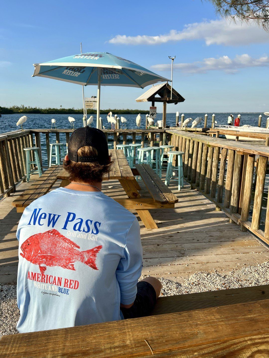New Pass tees on display in the shop