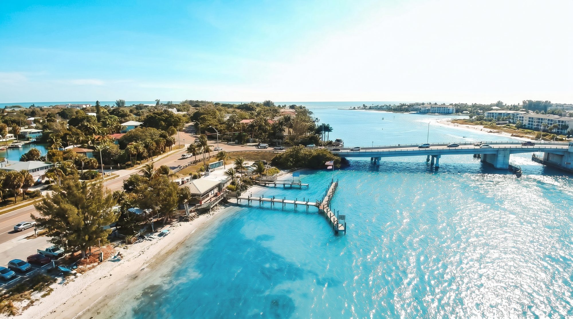 Aerial view of New Pass — the dock, grill and bait shop on the water